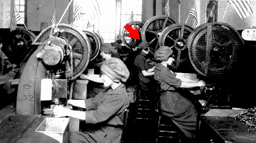Lorna (arrow) working at a cutting machine on the main floor at Cole & Lords Gents Accessories, in Chacallit, about 1918. Note flags mounted atop machines at Luther Hubers suggestion, to remind the women that belt buckles could win the war.